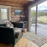 Log With Views Of Rondane Mountains