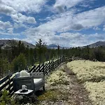 Log With Views Of Rondane Mountains *
