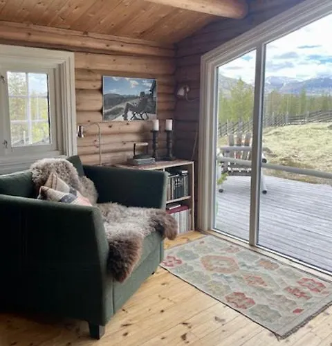 Log With Views Of Rondane Mountains